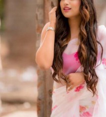 Escort ZOYA SINHA with black hair