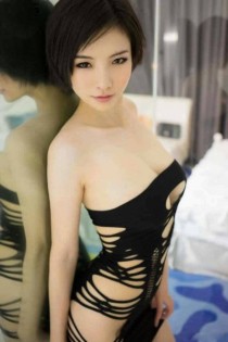 Escort Ada with brunette hair