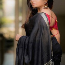 Escort PRIYANSHI NAMBIAR with black hair
