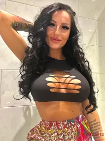 Escort Kira with Brunette hair