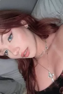 Escort Belva with red hair