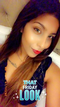 Escort Layba with brown hair