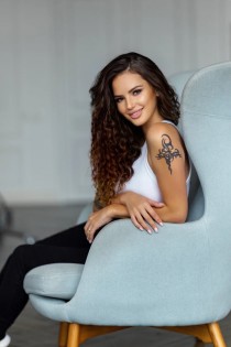 Escort Afina with brunette hair