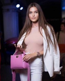 Escort Olenka with brown hair