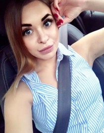 Escort Alena with brown hair