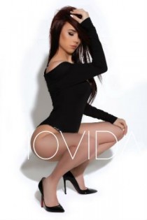 Escort Lucia with brunette hair